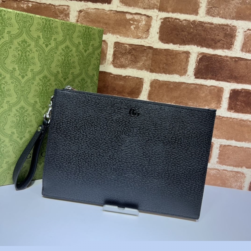 G*u*i clutch bags